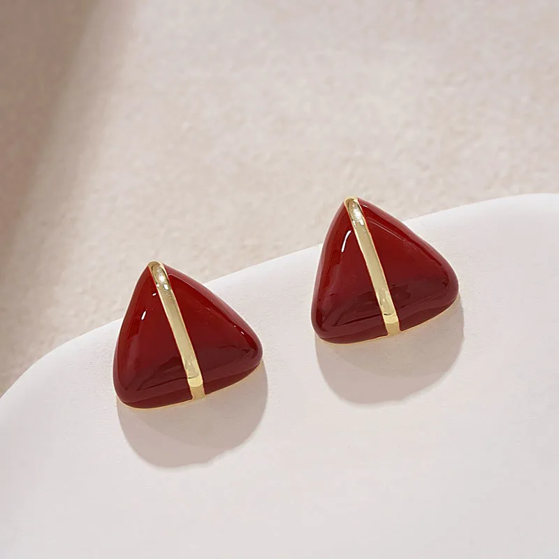 Ruby flair studs