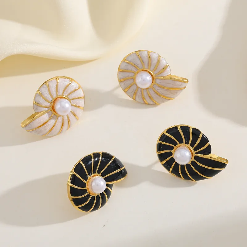 The Siren Shell Studs
